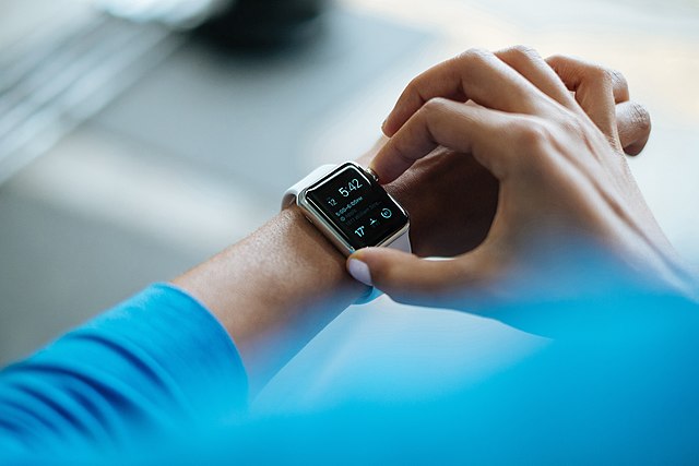 Person interacting with a smartwatch